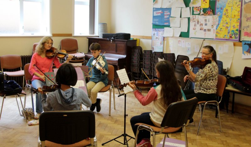 The Violins practicing