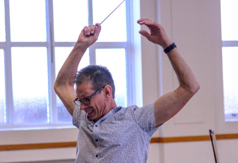 The conductor concetrating deeply