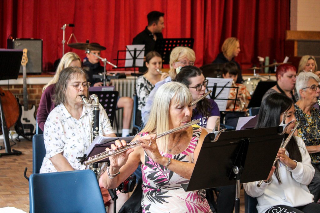 Flutes practicing in the Orchestra