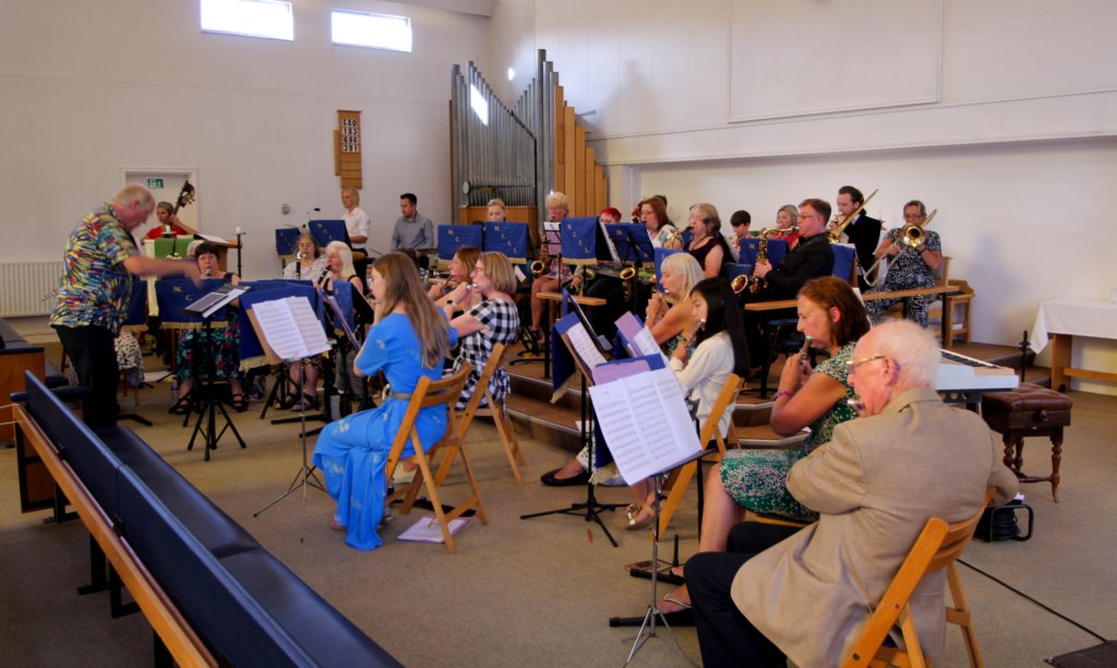 Orchestra practicing as a group