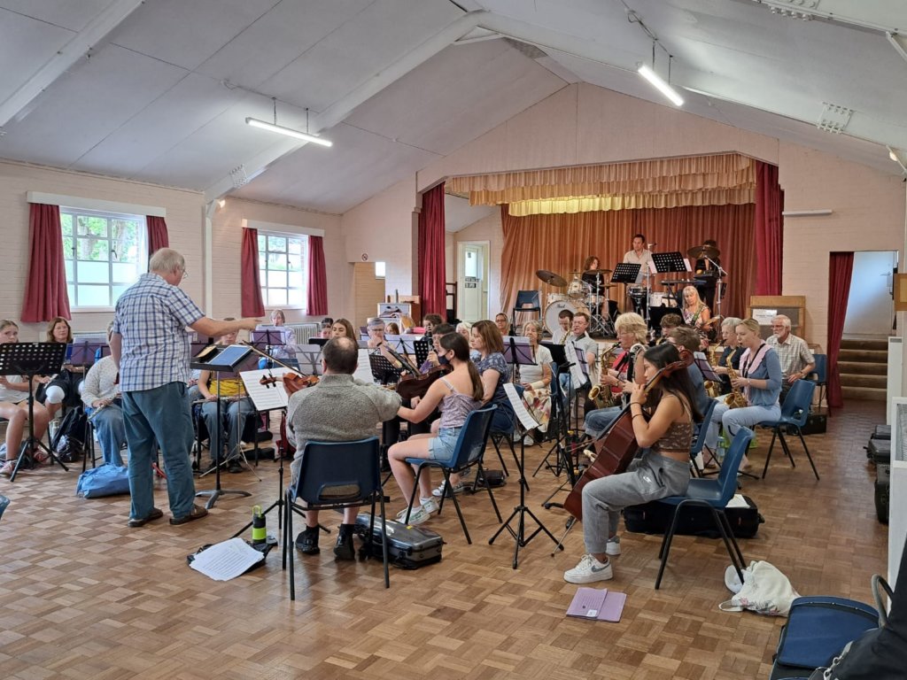 Orchestra practicing as a group